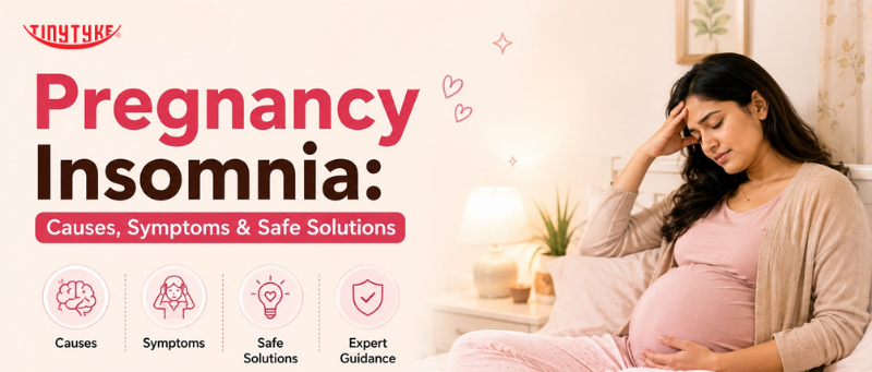 Pregnant woman experiencing insomnia while trying to sleep comfortably at night