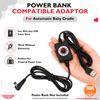 TinyTyke Power bank compatible adapter for automatic baby cradle held in a hand with product features listed.
