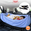 Child in a blue car seat hammock with TINY TYKE branding.