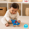 Child playing with a blue Wooden Pull-along Elephant Toy on a carpeted floor.