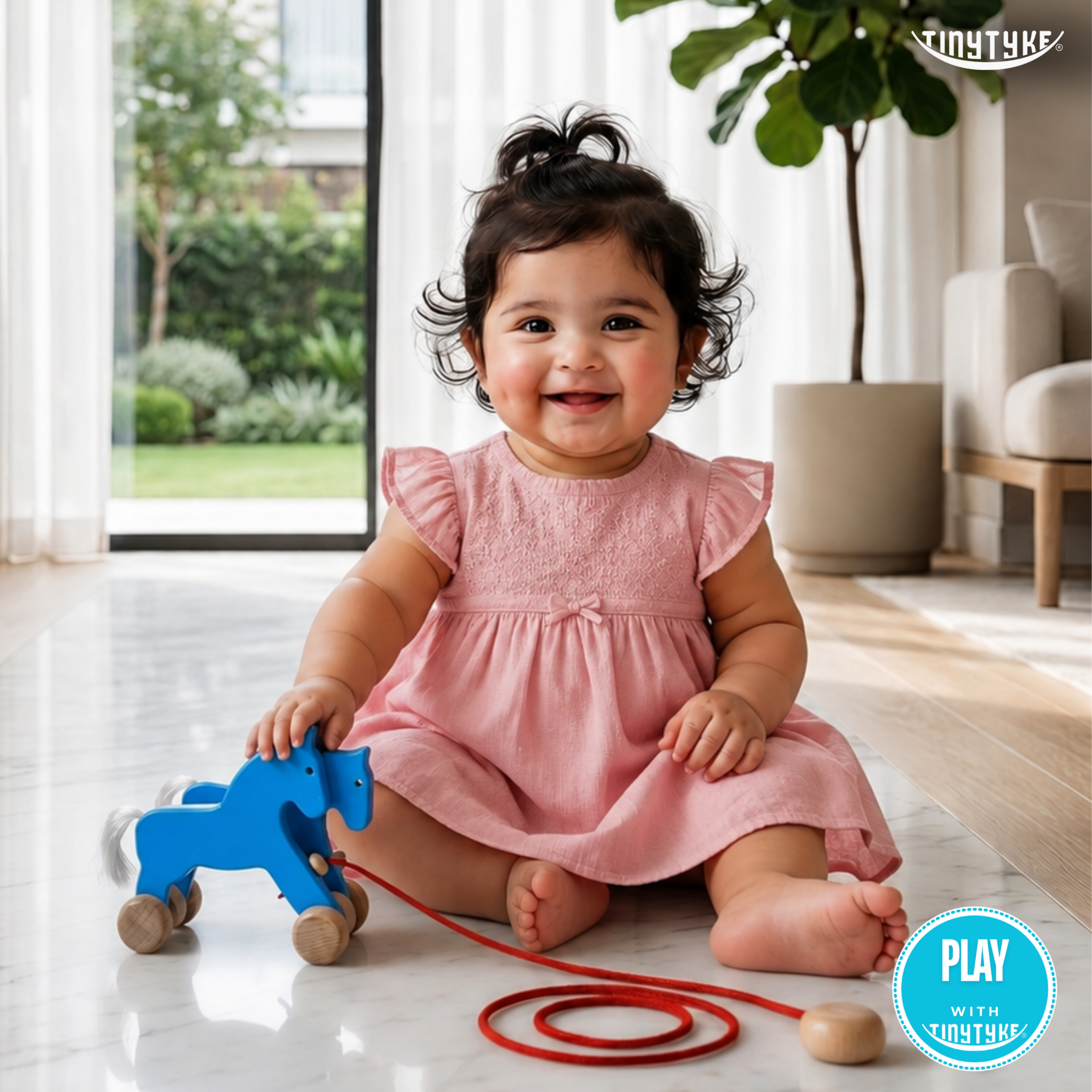 Child in a pink dress playing with a blue Wooden Pull-along Horse Toy in a bright room