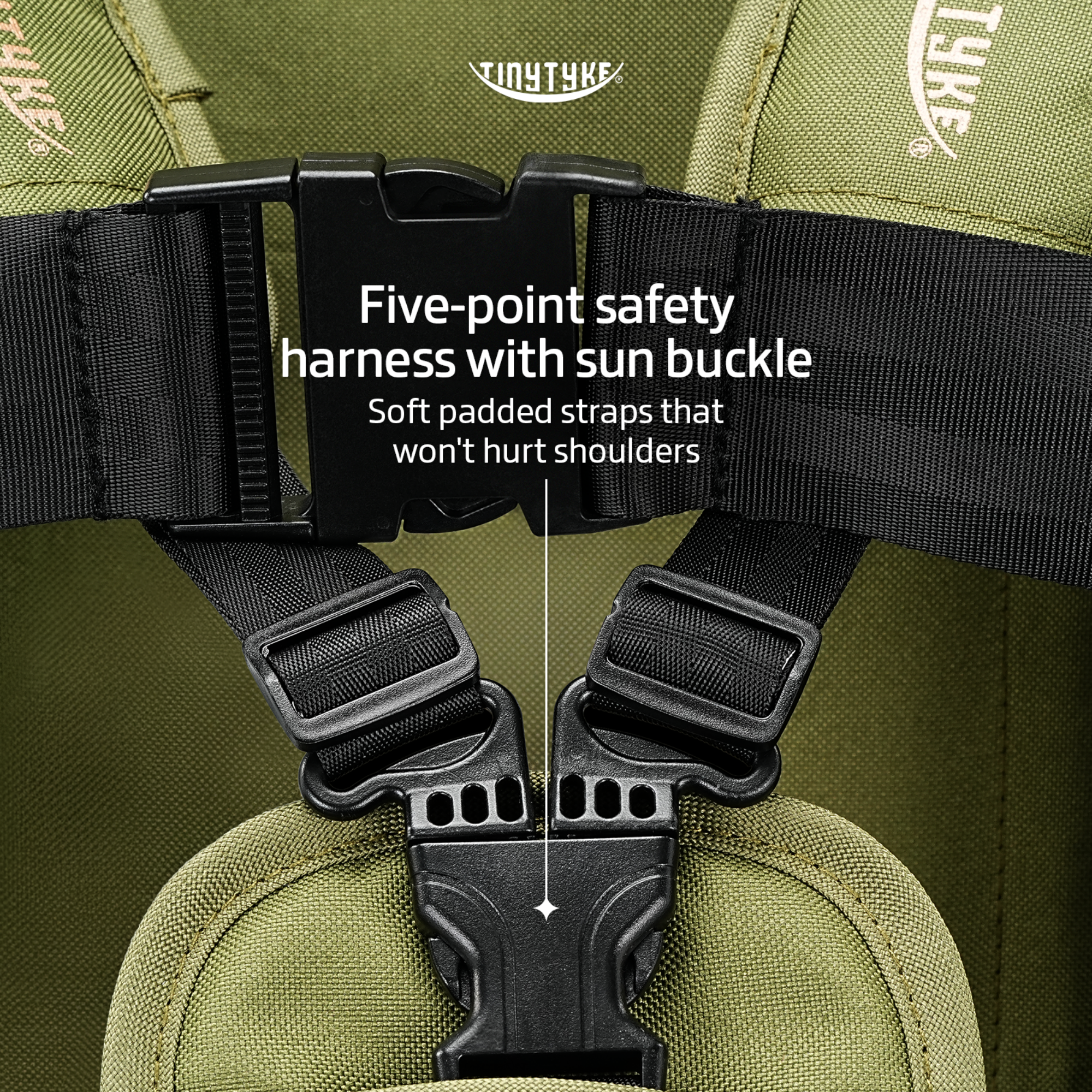 TinyTyke T3 stroller 5-point safety harness close-up — olive green, padded shoulder straps, double belt for toddlers